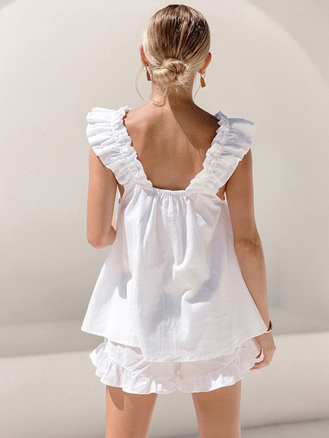 Two-piece women's summer outfit: ruffle top & shorts made of organic cotton