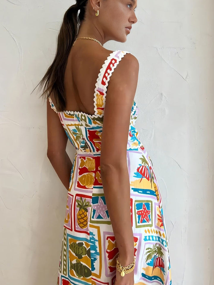 Sleeveless maxi dress with graffiti print – summer fashion with artistic flair