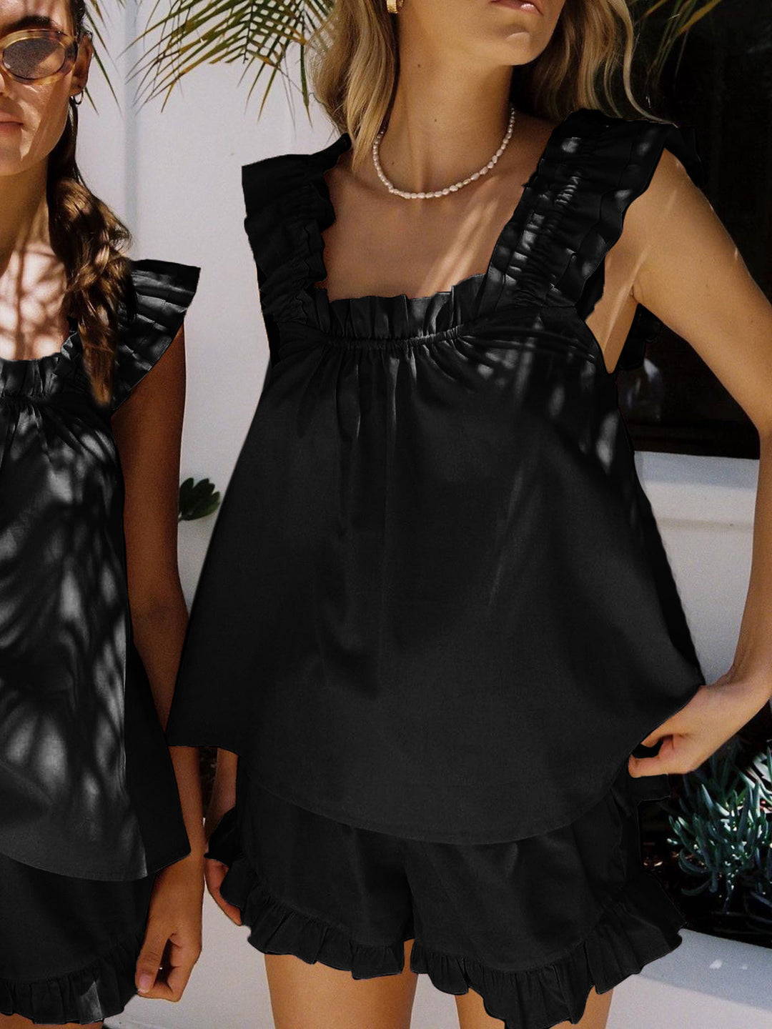 Two-piece women's summer outfit: ruffle top & shorts made of organic cotton