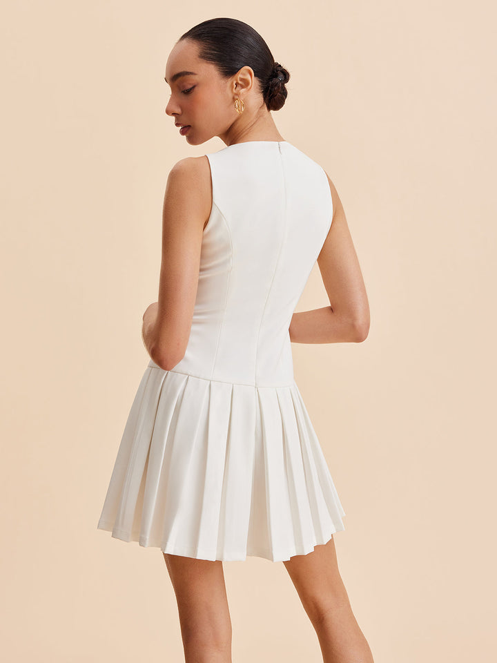 Elegant Sleeveless Mini Dress with Pleats and Metal Buttons