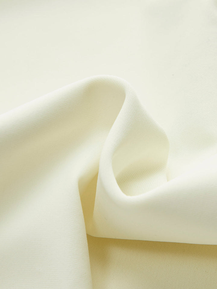 Elegant halterneck swimsuit with bow