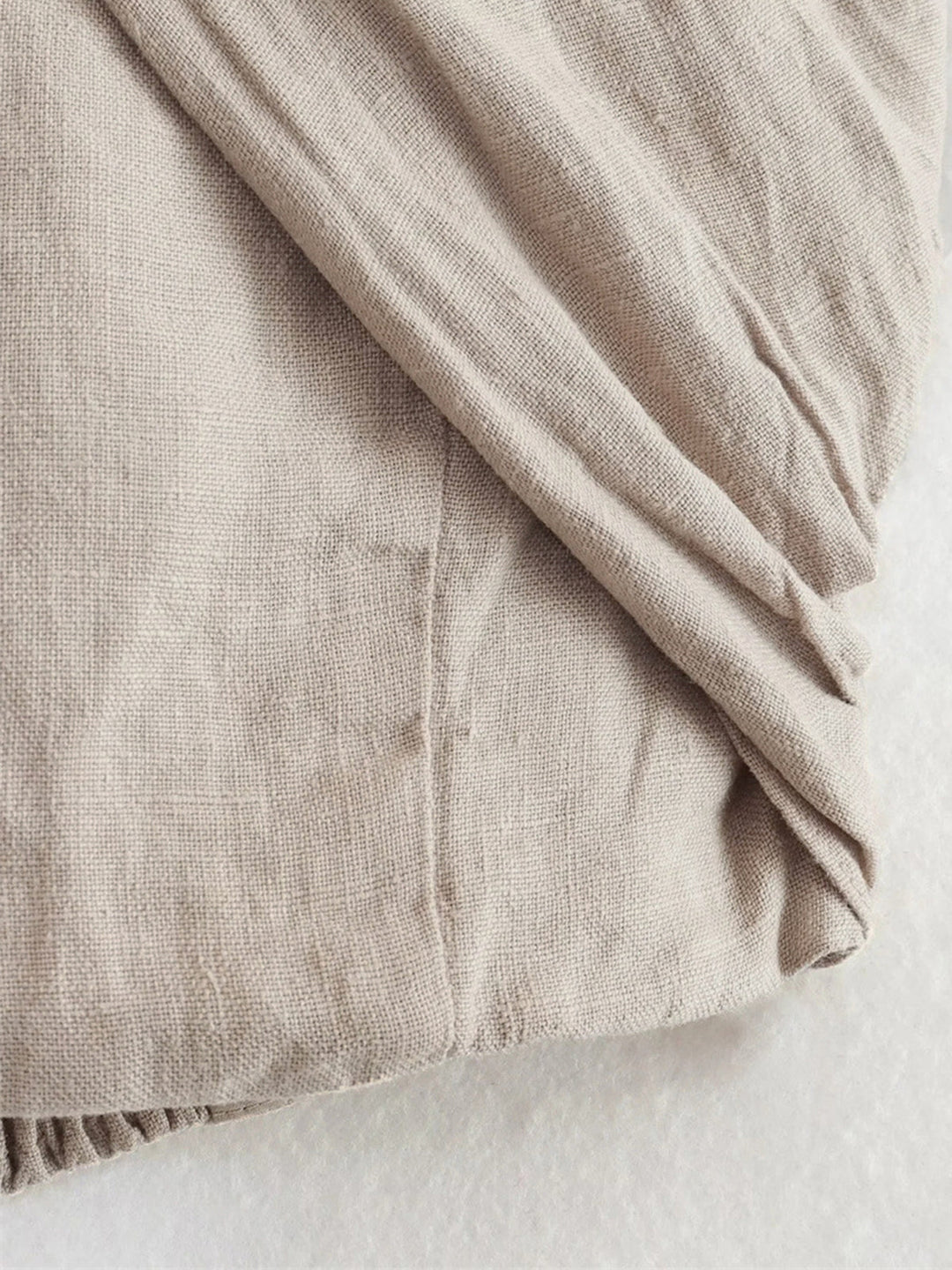 Women's summer halter top made of linen-cotton blend with crisscross design