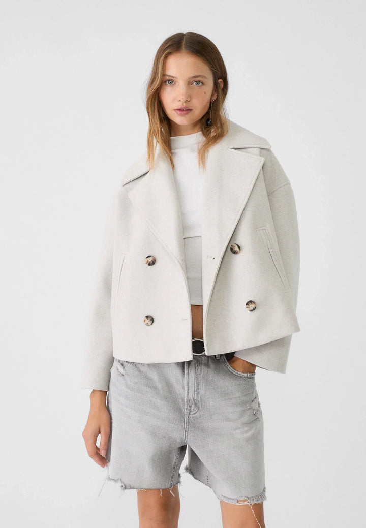 Manteau court pour femmes avec double rangée de boutons en cuir vegan