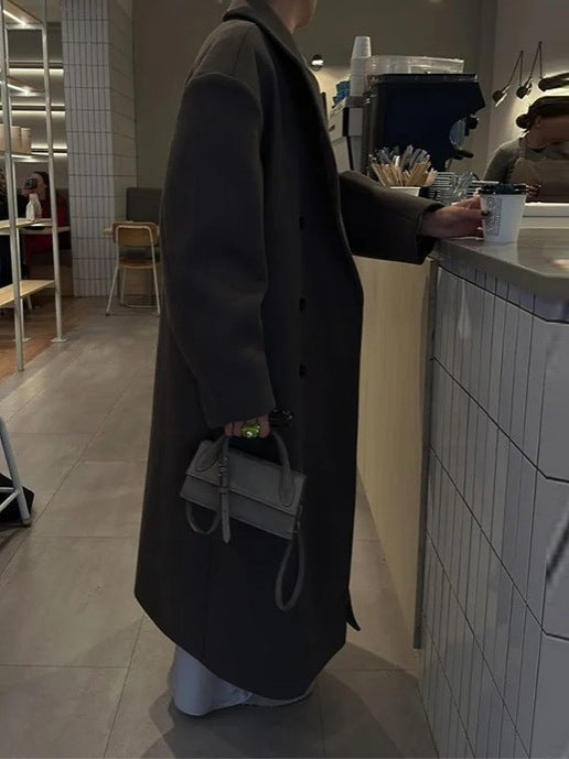 Women's oversized coat with lapel collar and high slit