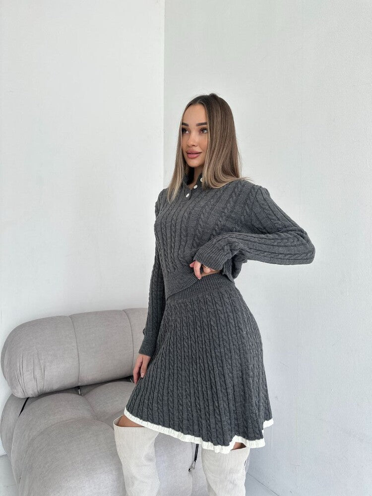 Women's knit dress with cable pattern and high-neck collar