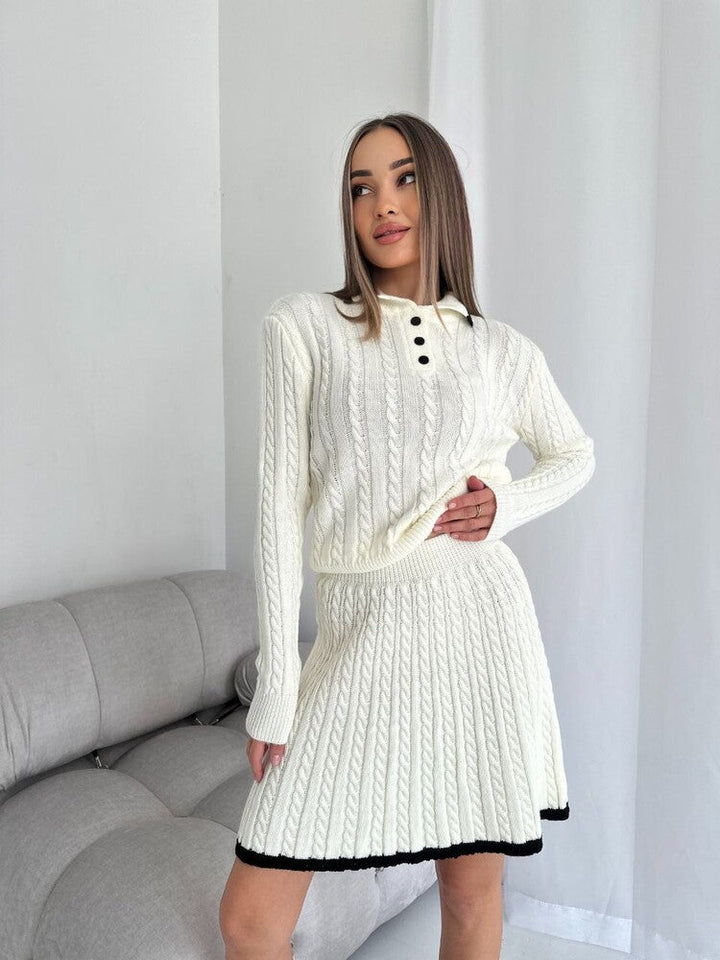 Women's knit dress with cable pattern and high-neck collar