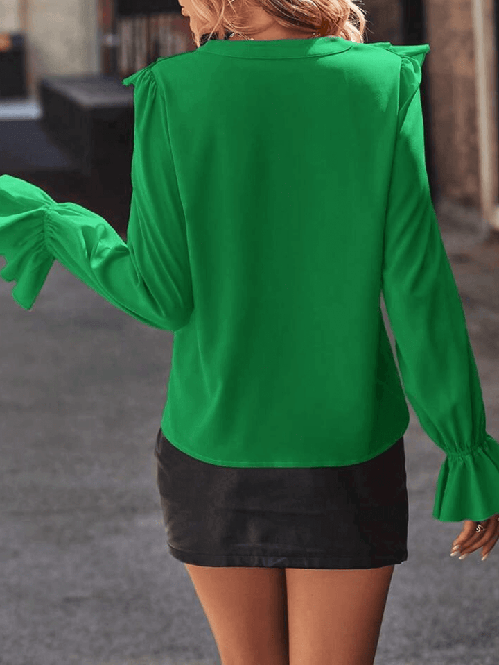 Women's blouse with ruffles V-neck and flared sleeves