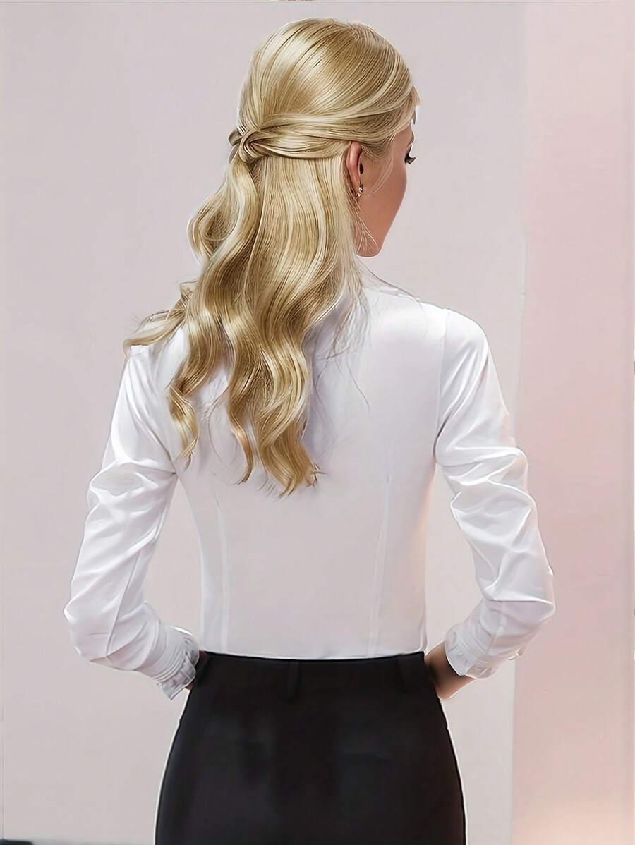 Women's blouse with ruffles and high turtleneck collar