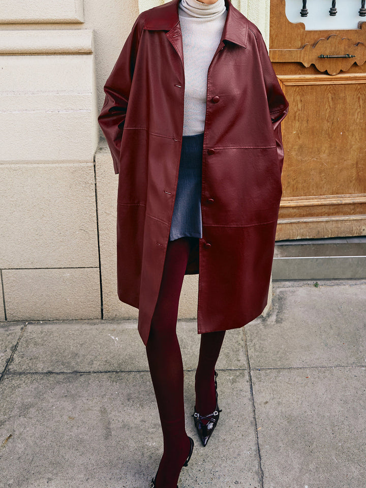 Long women's jacket with pockets and button, timeless style for every occasion