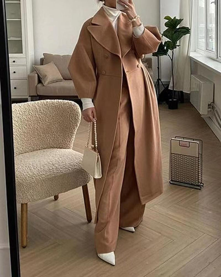 Elegant long women's trench coat – lapel collar & lantern sleeves – modern
