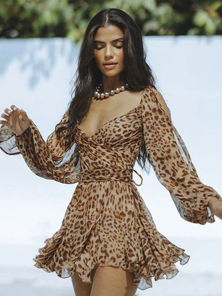 Elegant women's wrap dress with pleated skirt