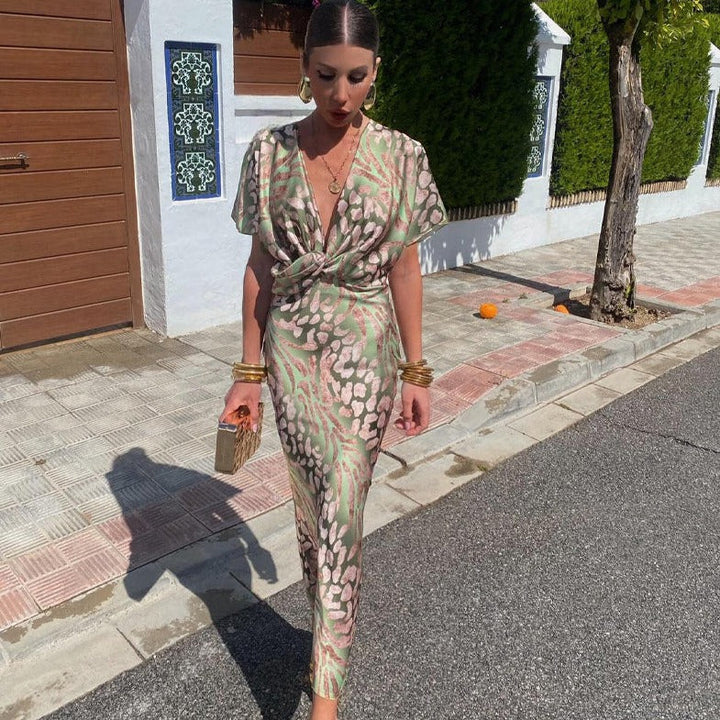 Women's midi dress with twist detail and elegant cut