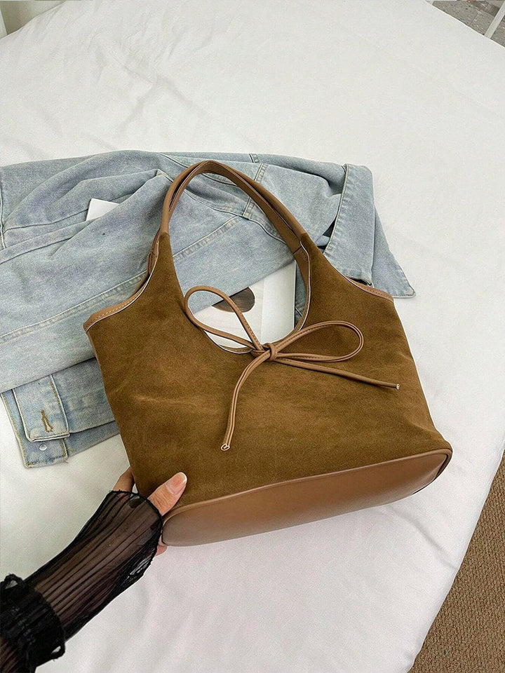Vegan suede shoulder bag with bow – Elegant & sustainable