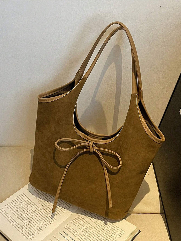 Vegan suede shoulder bag with bow – Elegant & sustainable