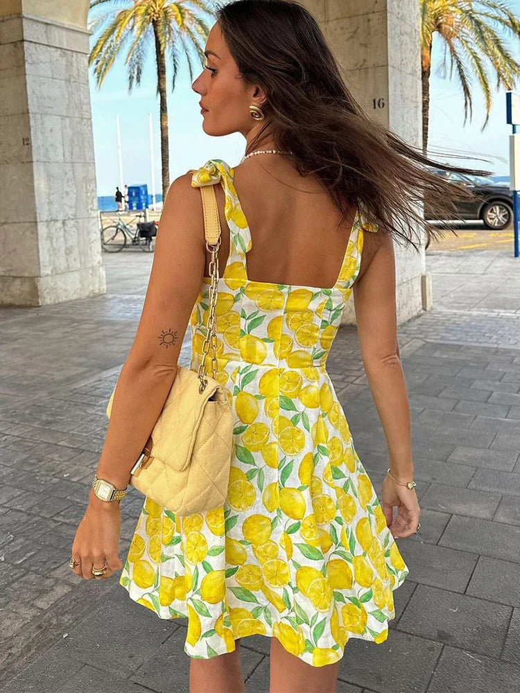 Women's summer dress with ruffles – lemon print & V-neckline