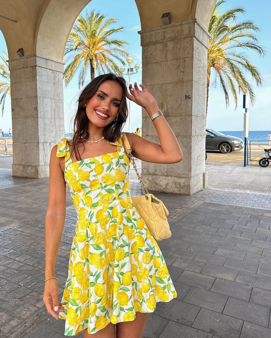 Women's summer dress with ruffles – lemon print & V-neckline