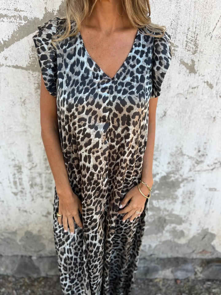 Women's chiffon dress with leopard print and flowing cut
