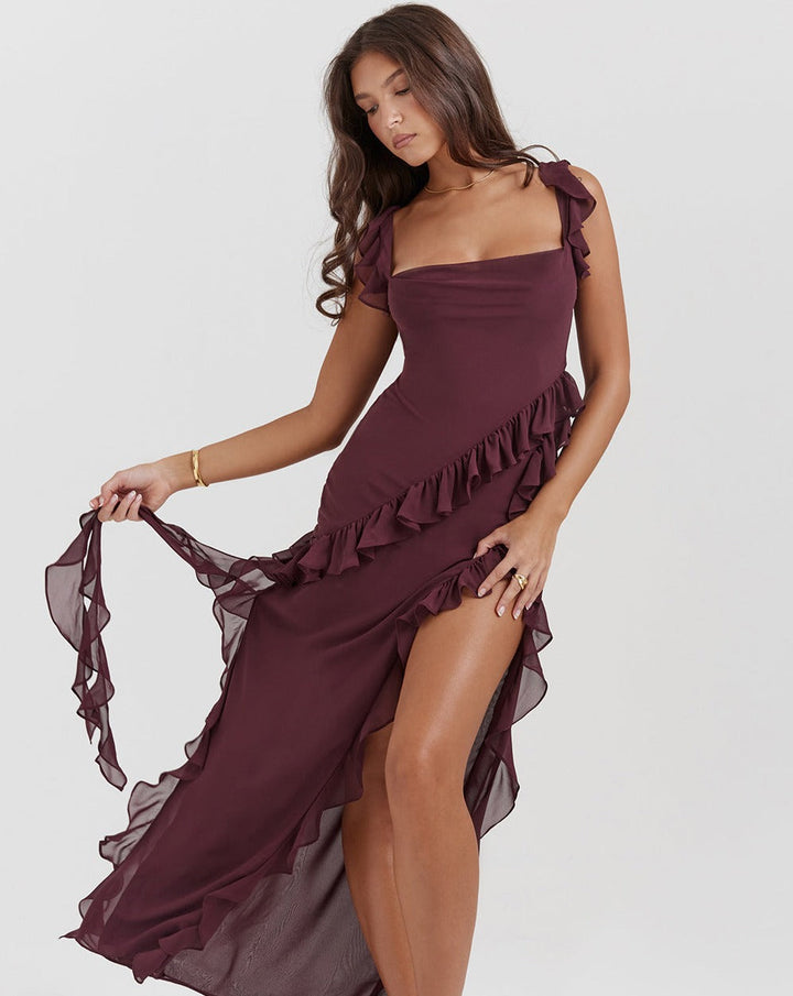 Elegant one-shoulder evening dress with ruffles and high slit