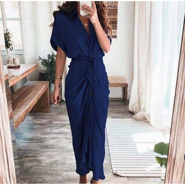 Women's midi dress made of cotton with a figure-hugging cut and button placket