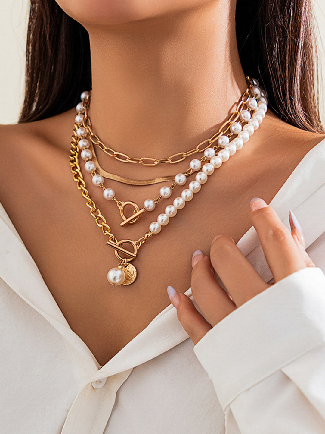 Elegant pearl necklace with gold chain – multi-strand design
