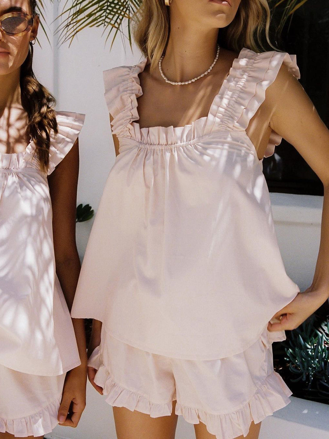 Two-piece women's summer outfit: ruffle top & shorts made of organic cotton