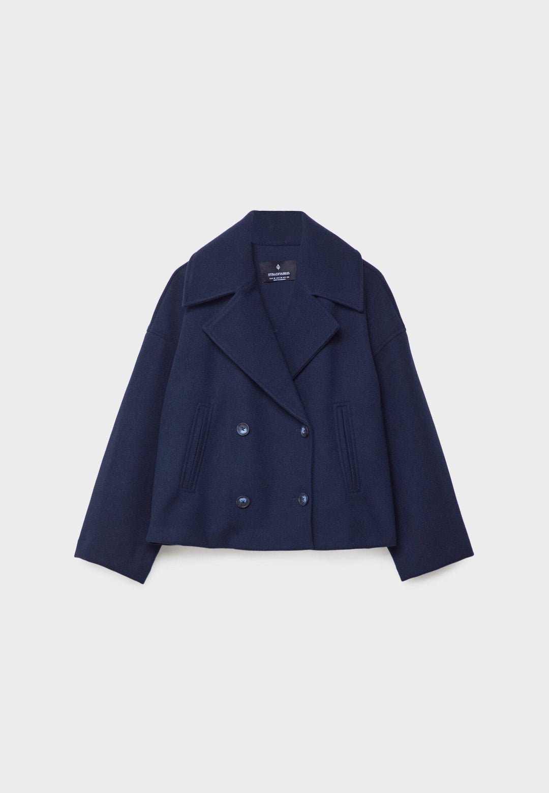 Short women's coat with double row of buttons made of vegan leather