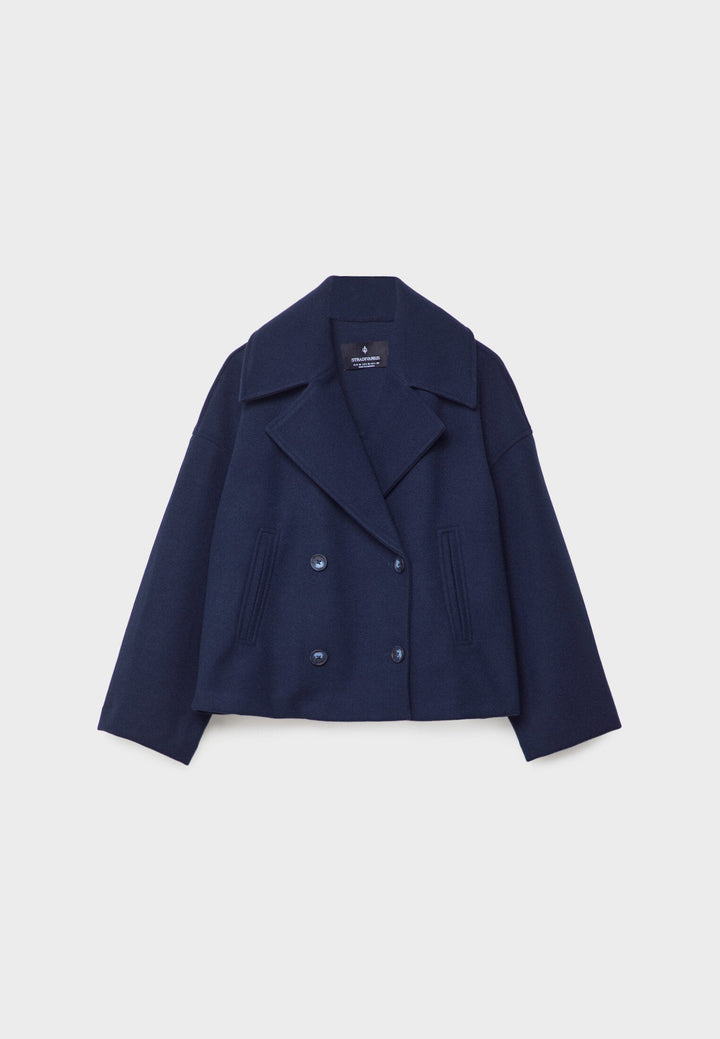 Short women's coat with double row of buttons made of vegan leather
