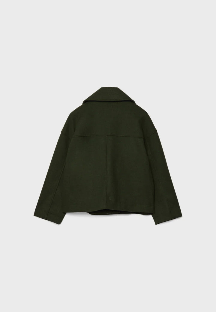 Short women's coat with double row of buttons made of vegan leather