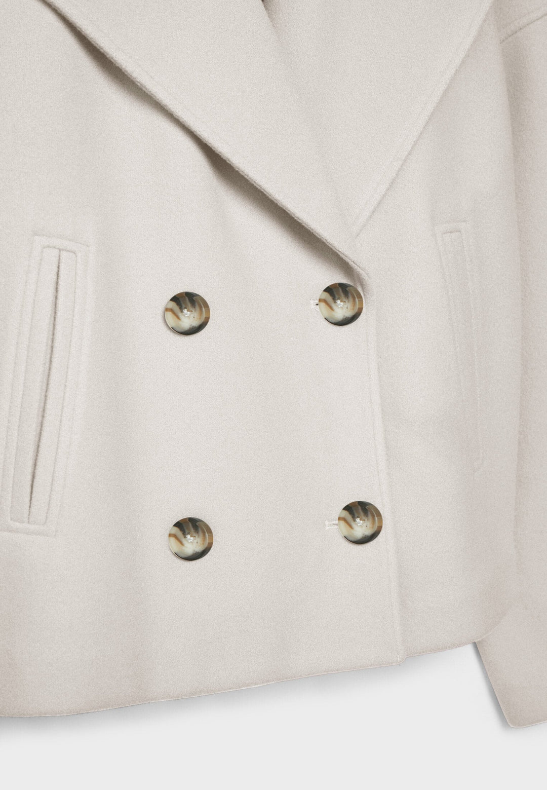 Short women's coat with double row of buttons made of vegan leather