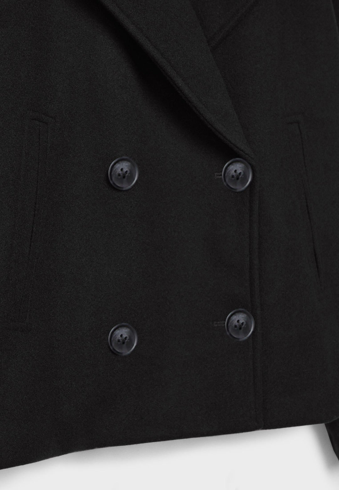 Short women's coat with double row of buttons made of vegan leather