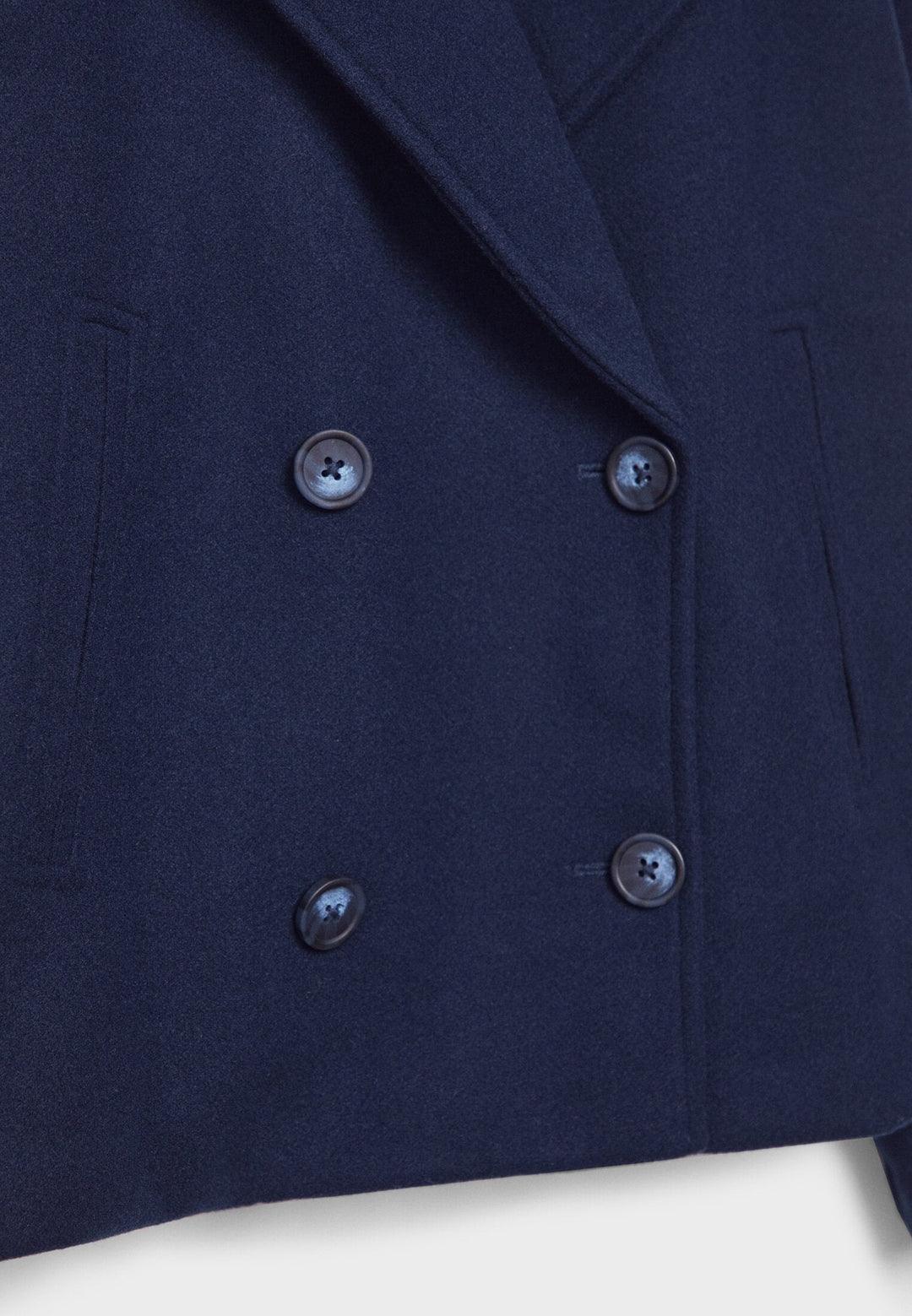 Short women's coat with double row of buttons made of vegan leather