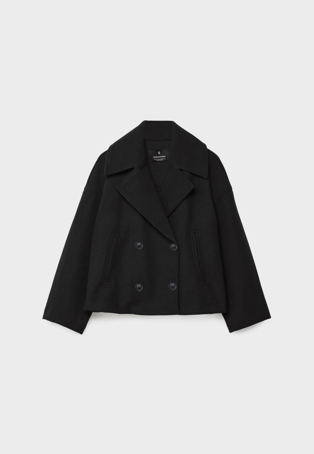 Short women's coat with double row of buttons made of vegan leather