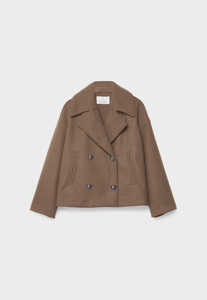 Short women's coat with double row of buttons made of vegan leather
