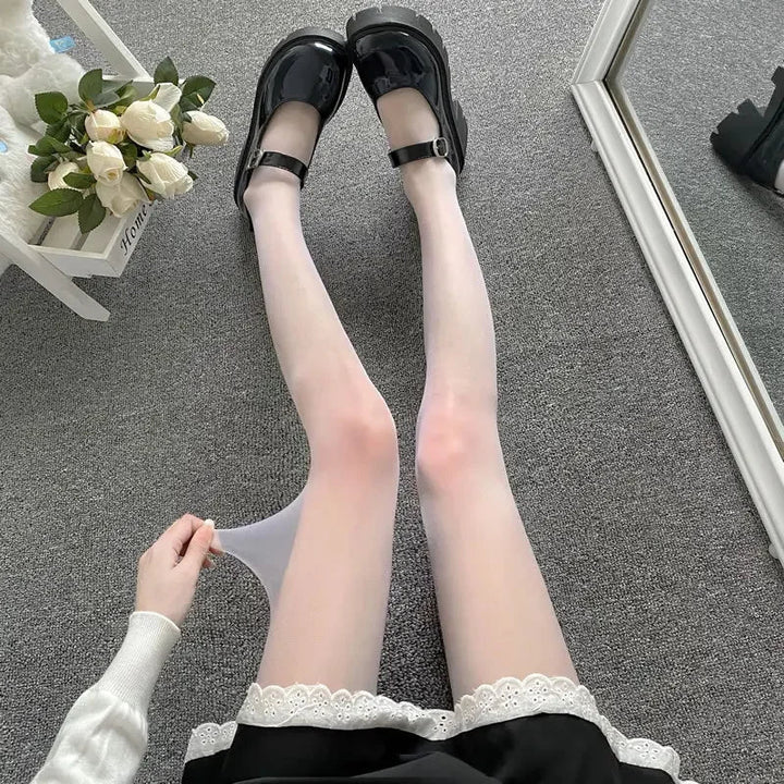 Women's patterned thigh-high tights