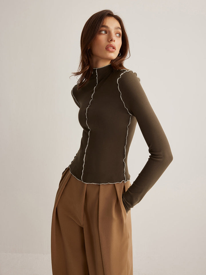 Haut pour femmes en jersey avec col montant et passepoil contrasté design élégant