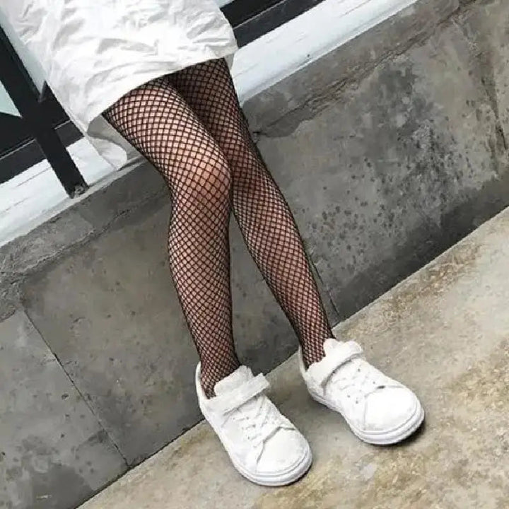 Women's tights with herringbone pattern made of elastic material