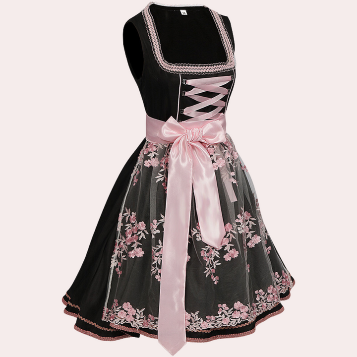 Women's traditional dress with floral embroidery and elegant lacing