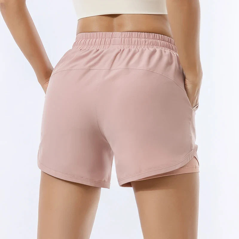 Short de sport pour femmes premium avec transport d'humidité et slip intérieur