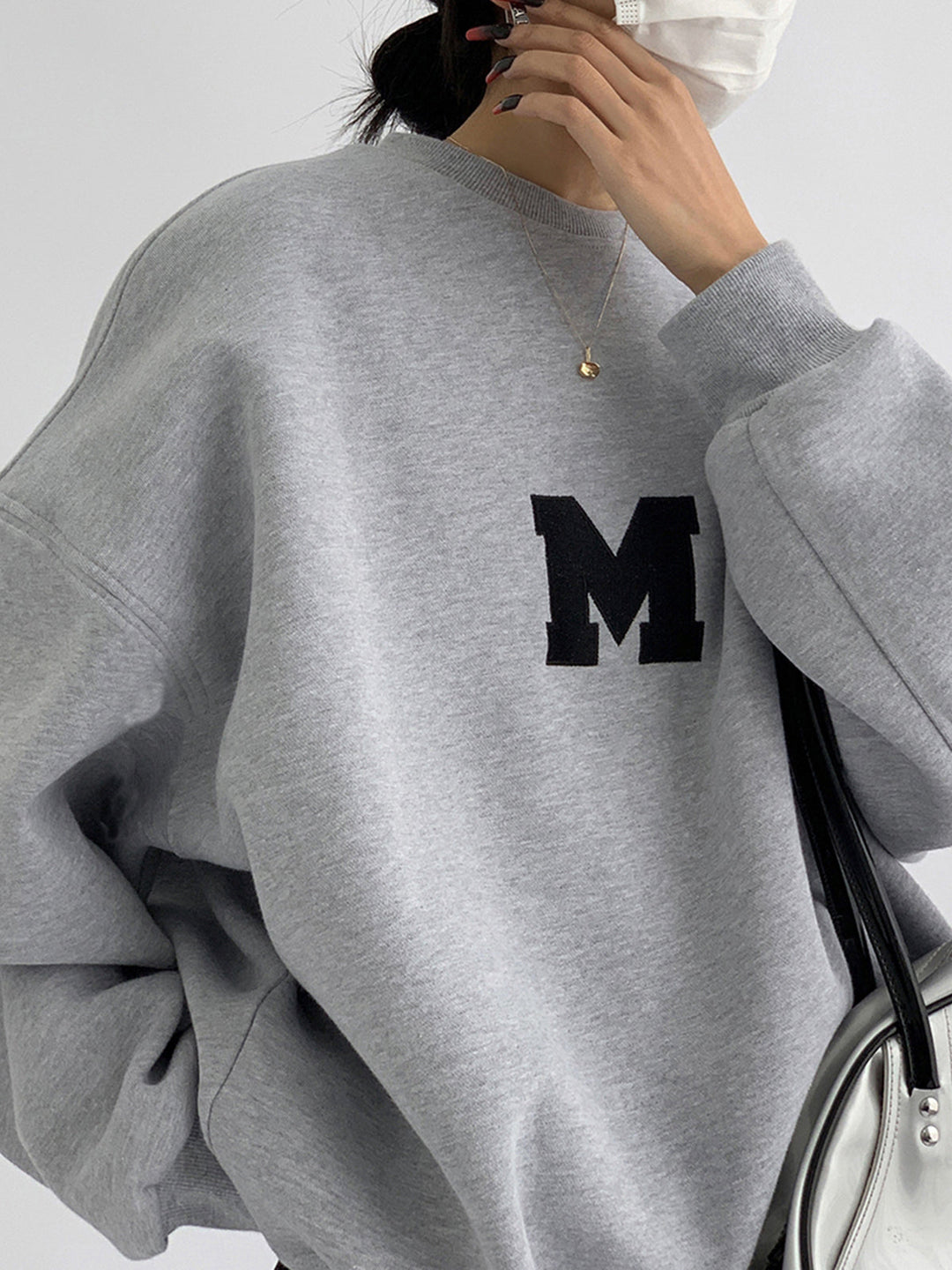 Sweatshirt surdimensionné pour femmes au design minimaliste