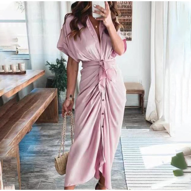 Women's midi dress made of cotton with a figure-hugging cut and button placket