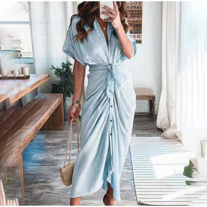Women's midi dress made of cotton with a figure-hugging cut and button placket