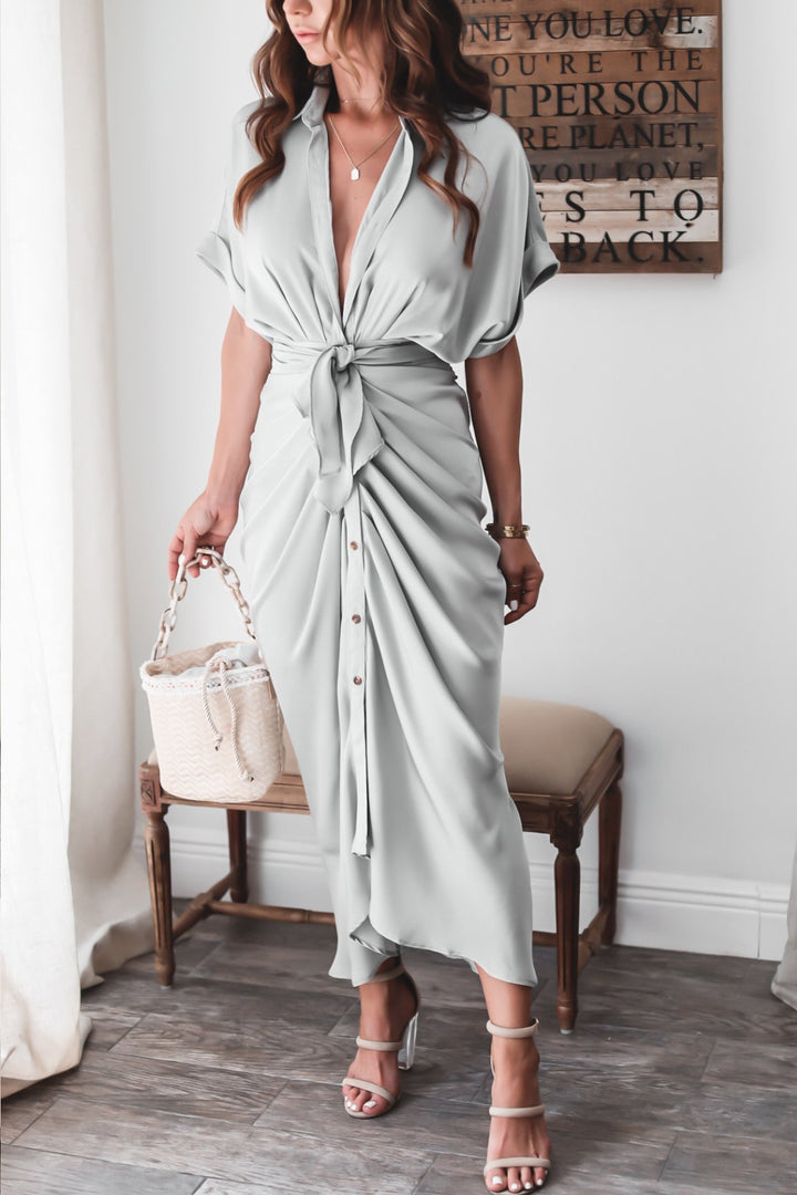 Women's midi dress made of cotton with a figure-hugging cut and button placket