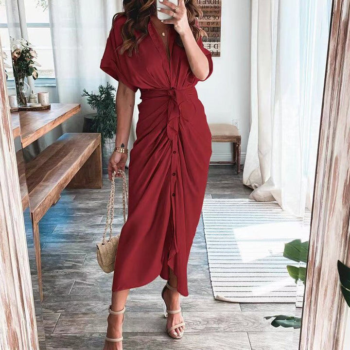 Women's midi dress made of cotton with a figure-hugging cut and button placket