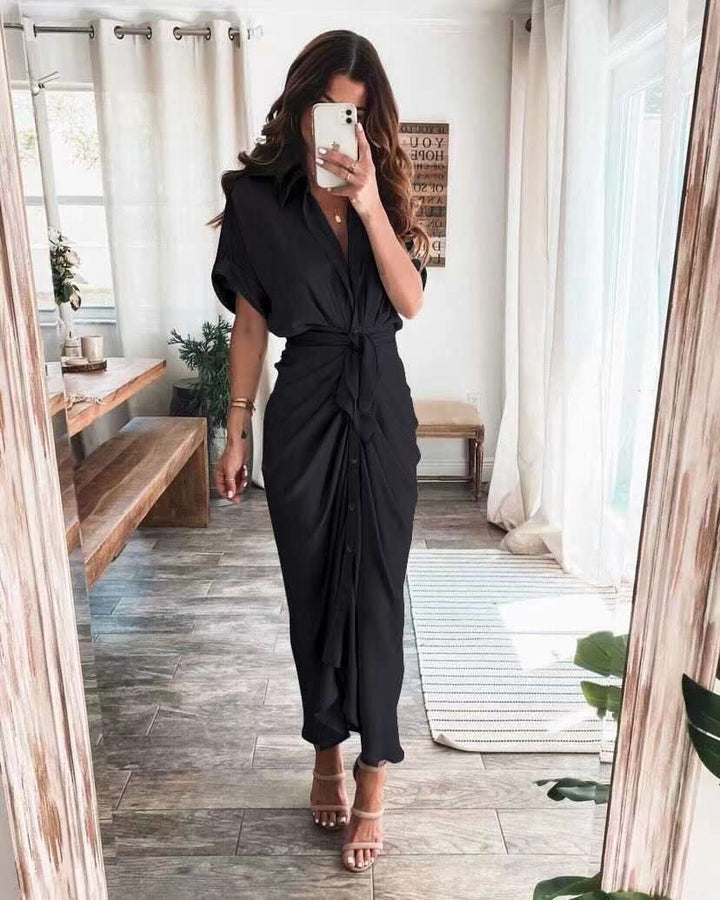 Women's midi dress made of cotton with a figure-hugging cut and button placket