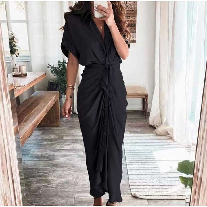 Women's midi dress made of cotton with a figure-hugging cut and button placket