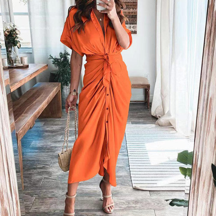 Women's midi dress made of cotton with a figure-hugging cut and button placket