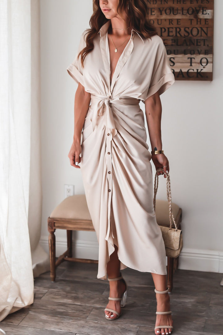 Women's midi dress made of cotton with a figure-hugging cut and button placket