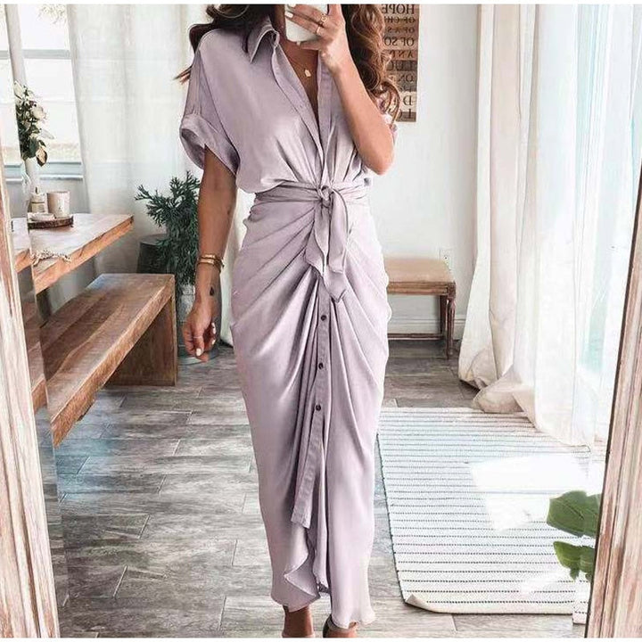 Women's midi dress made of cotton with a figure-hugging cut and button placket