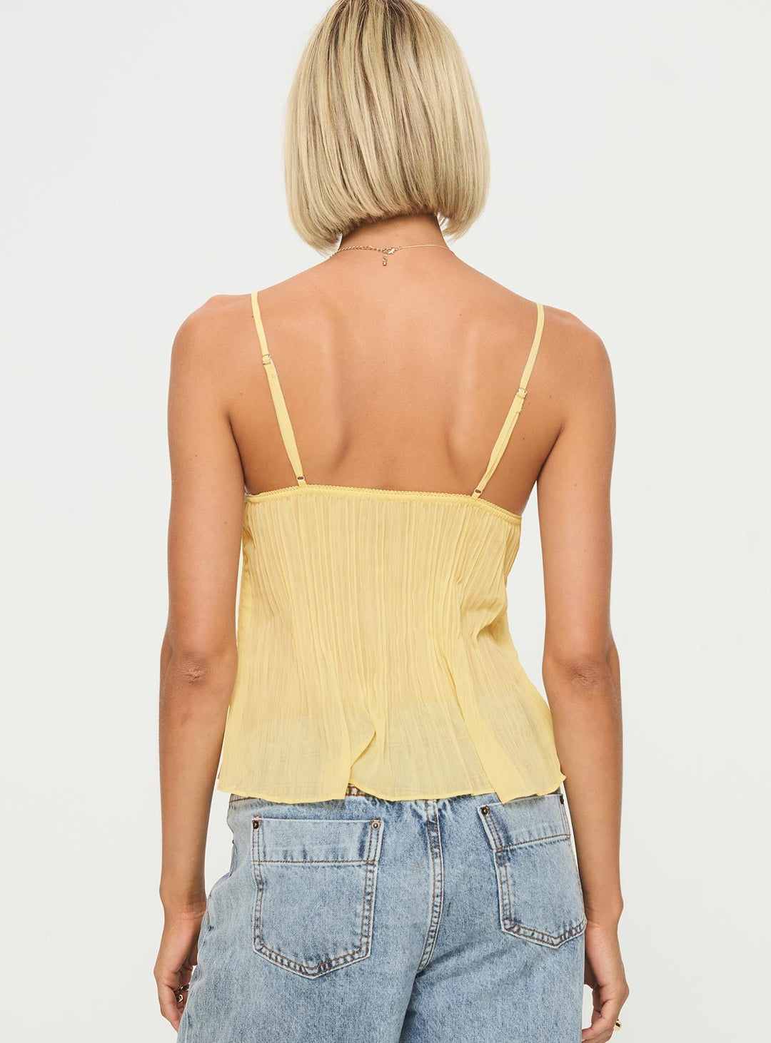 Women's top with pleats and elegant cut for summer